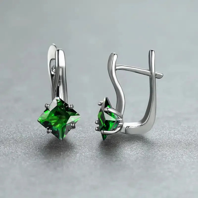 Pair of women's copper earrings with diamond design and inlaid zircon stones in blue, green, or natural colour options.