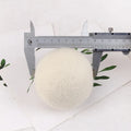 Wool drying balls in various sizes from 2cm to 5cm with cotton storage bag