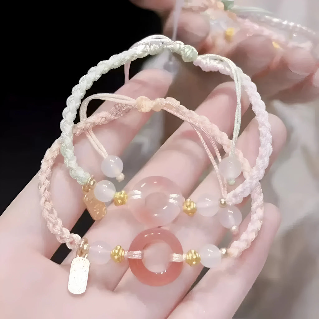 National style peach blossom patterned woven bracelet with peace buckle closure in three colour options