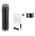 A black or blue mini portable electric shaver with a detachable rotary head and USB charging cable.