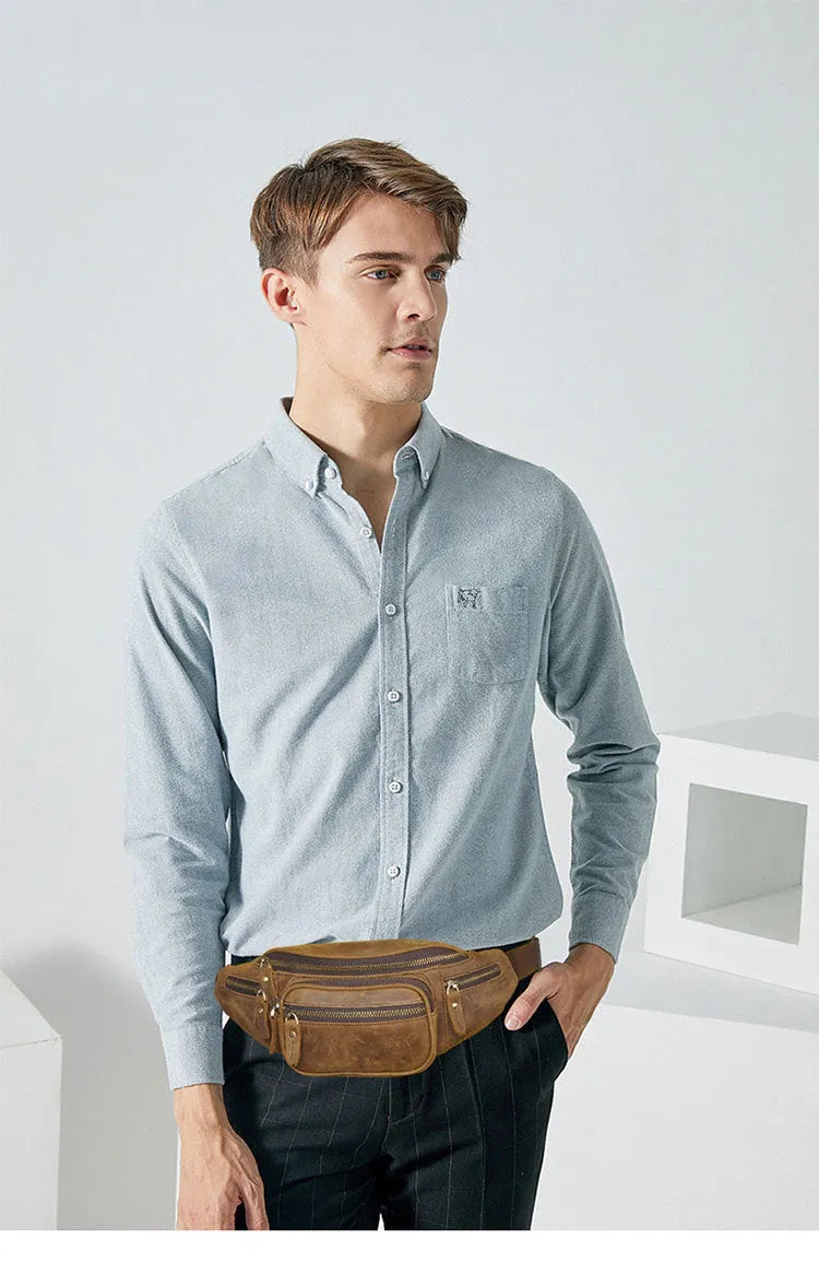 Brown leather shoulder messenger bag with adjustable strap showing interior compartments