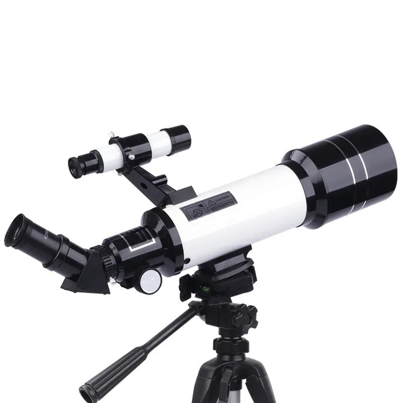 Dark blue children's astronomical telescope with monocular eyepiece on a tripod.
