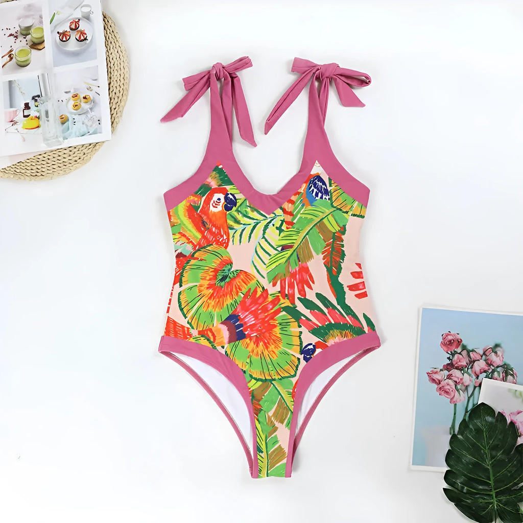 Retro pink floral print one-piece swimsuit with V-neck, covered belly and thin skirt overlay
