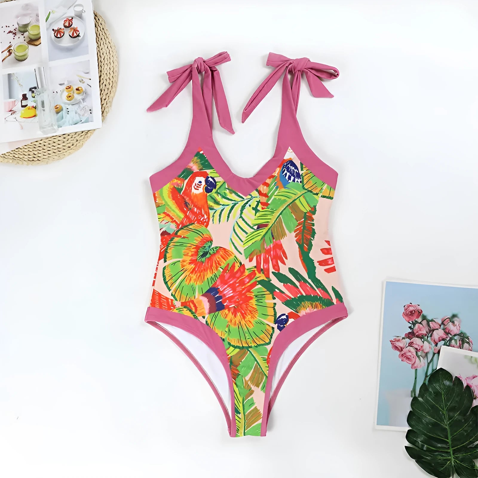 Retro pink floral print one-piece swimsuit with V-neck, covered belly and thin skirt overlay