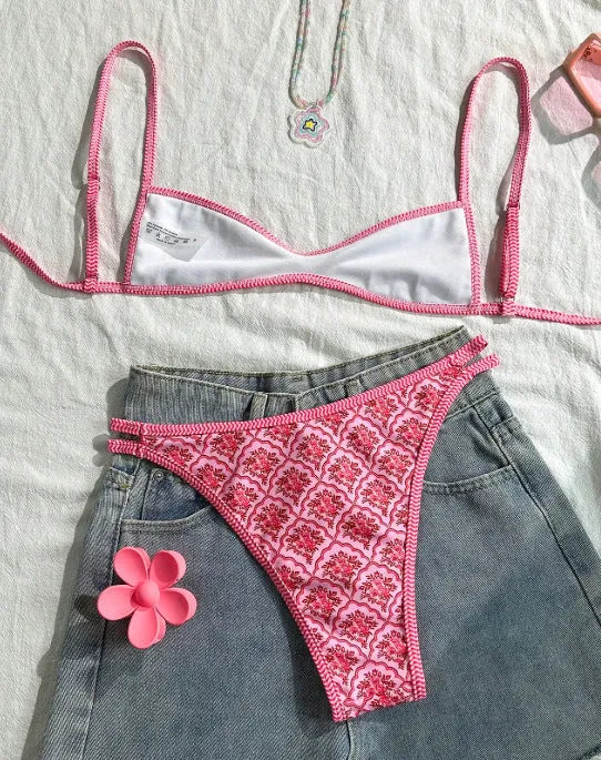 Pink printed two-piece bikini set with shoulder straps and exposed back cut-out for ladies
