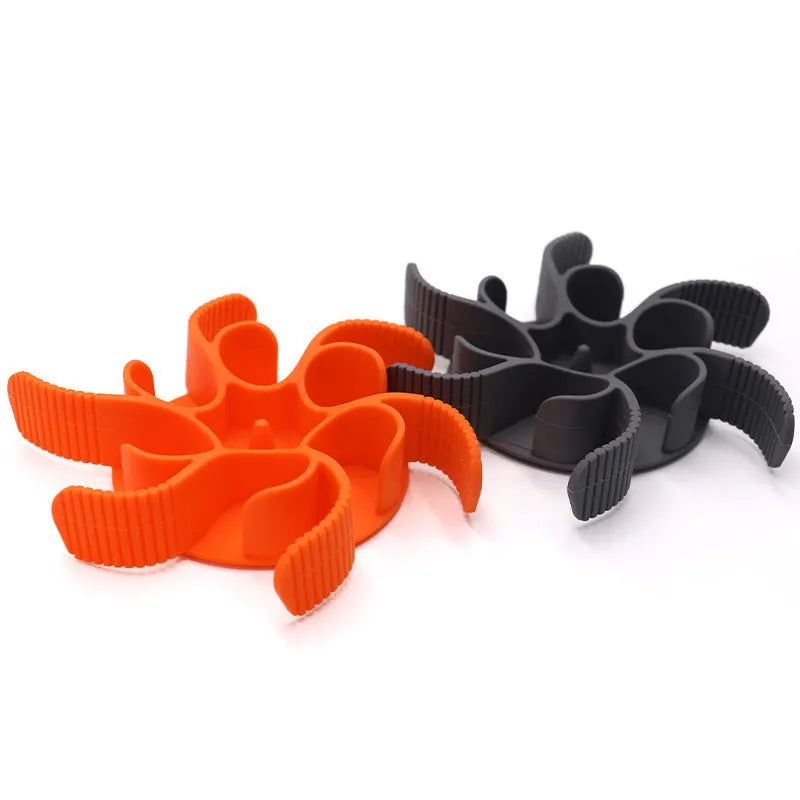 Red silicone dog slow feeder insert with spiral design and suction cups on base.