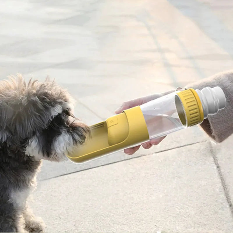 Portable dog water bottle with integrated drinking bowl in dark blue, white, or yellow