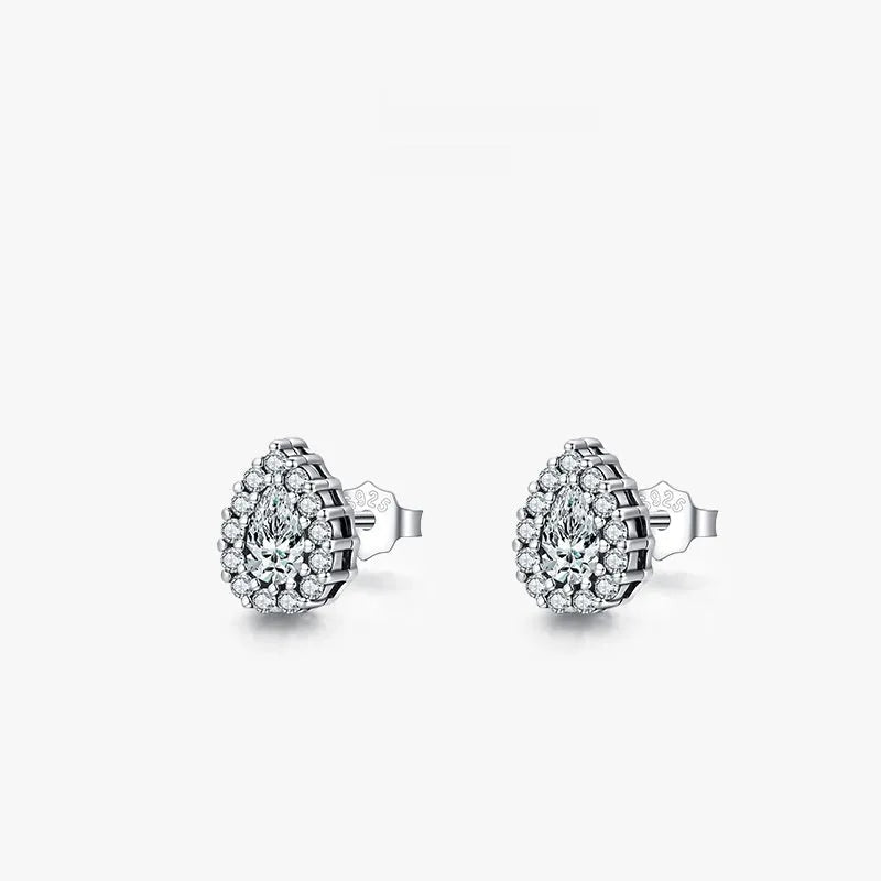 Close-up of women's silver water drop shaped ear studs made from 925 sterling silver.