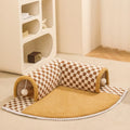 Brown and yellow plaid plush cat tunnel bed with central mat and non-slip bottom.