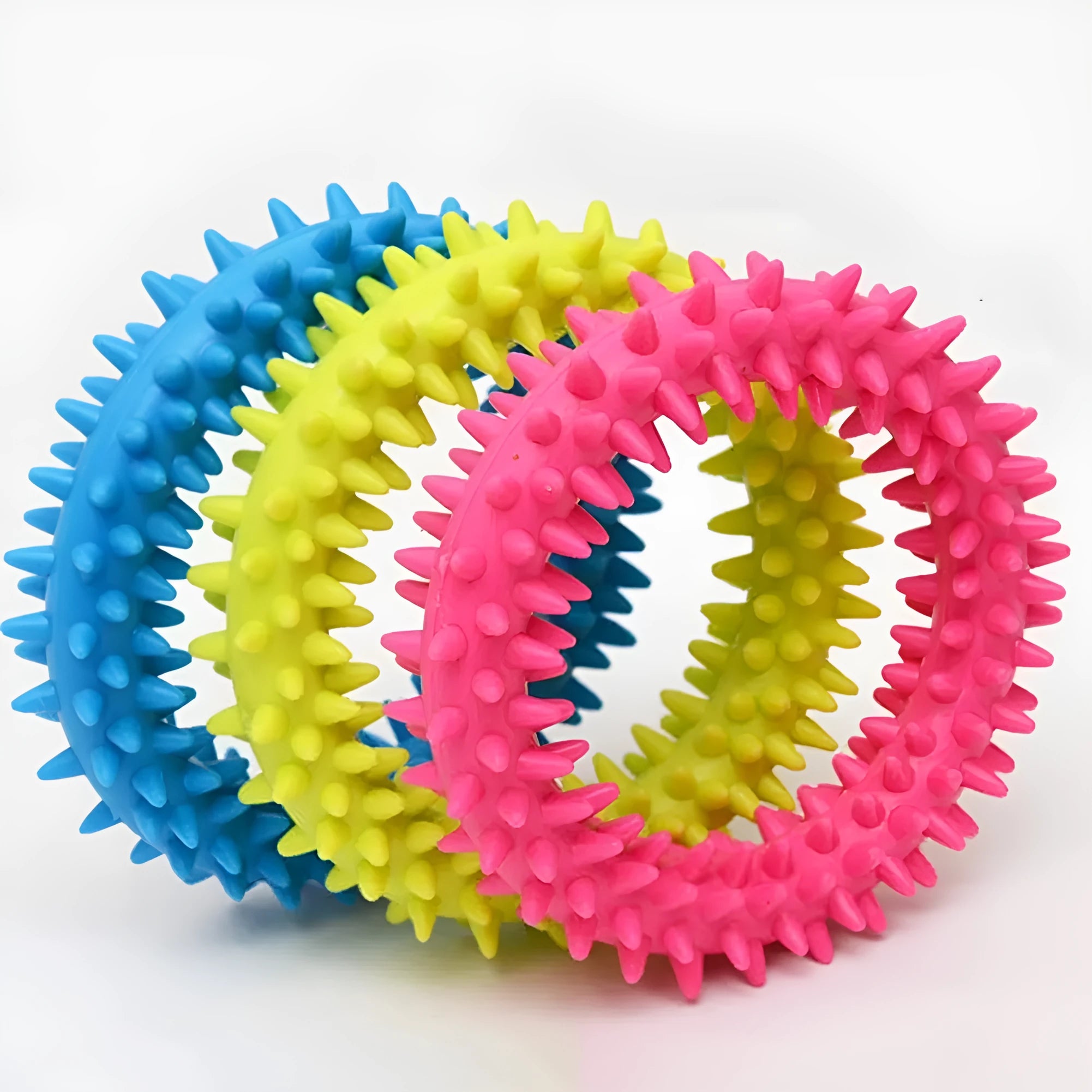 Blue TPR spiky circle ring dog chew toy on a white background.