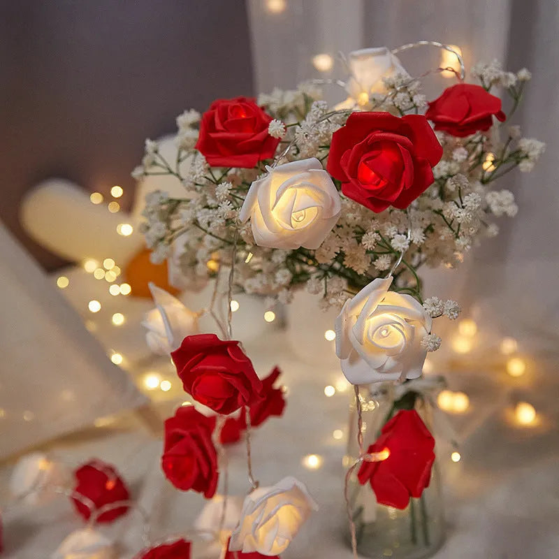 LED rose shaped coloured lights on 1.5m cable with battery power unit for indoor holiday decoration