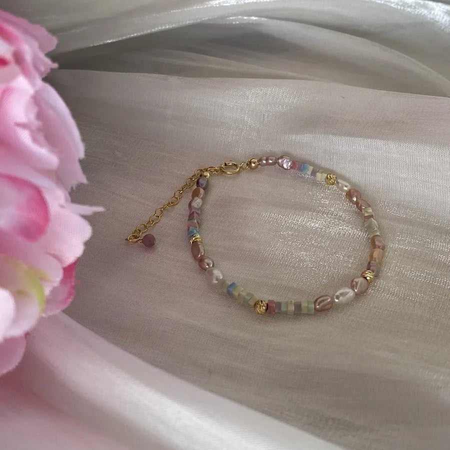 Natural irregular pearl bracelet and necklace set in 14k gilded purple silver tone.