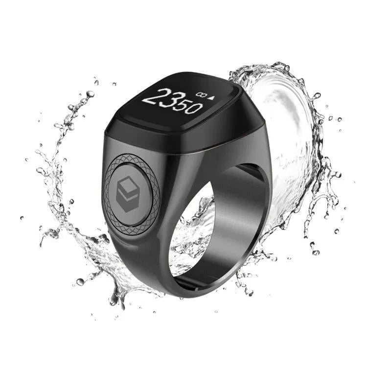 Zikr1 metal smart ring with OLED screen on a finger, showing tasbih count.