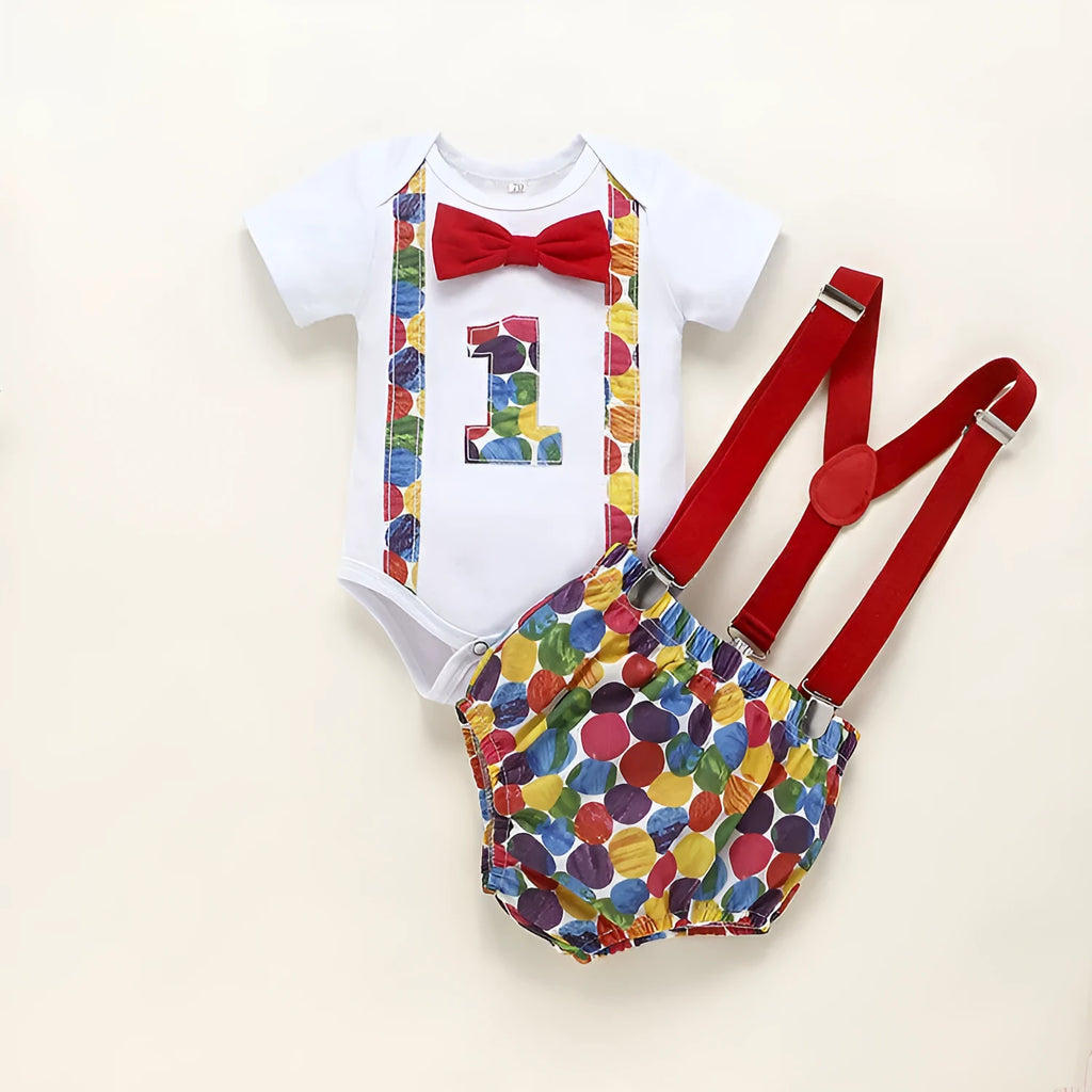 Children's blue cotton romper with shorts, bow, and dinosaur print on front