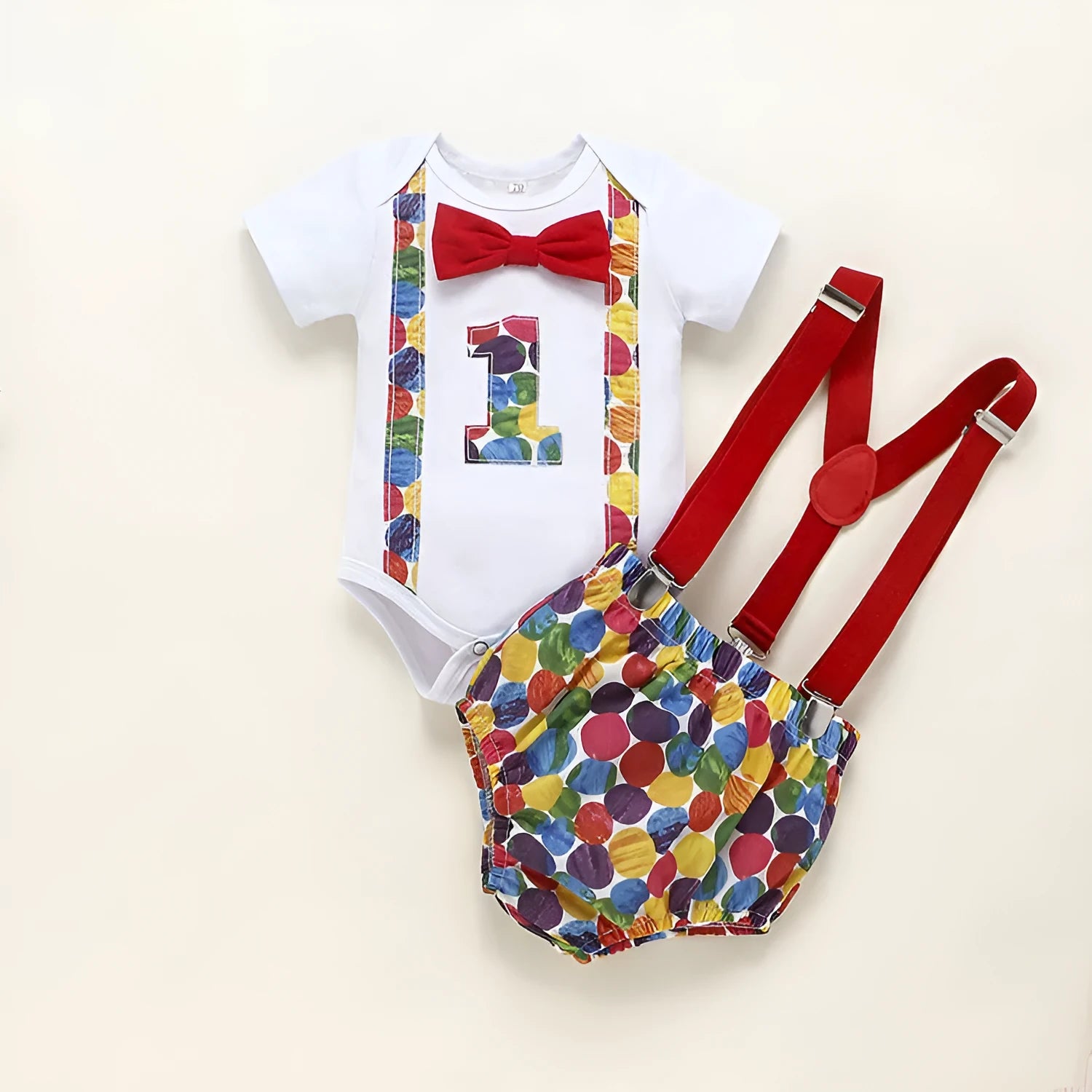Children's blue cotton romper with shorts, bow, and dinosaur print on front