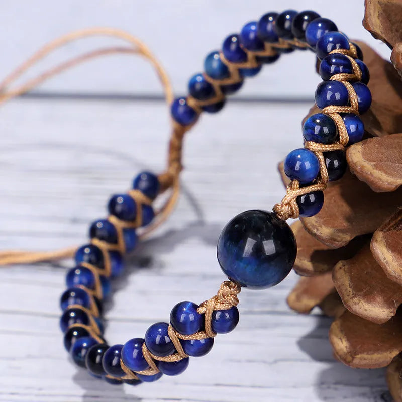 Handmade woven geometric pull bracelet with adjustable sliding knot in blue tiger eye stone