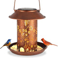 Solar-powered hummingbird pattern iron art bird feeder with integrated LED garden light