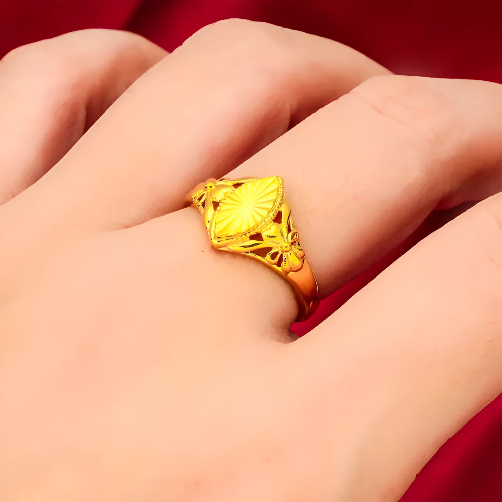 Geometric gold open ring with textured diamond flower detail on brass