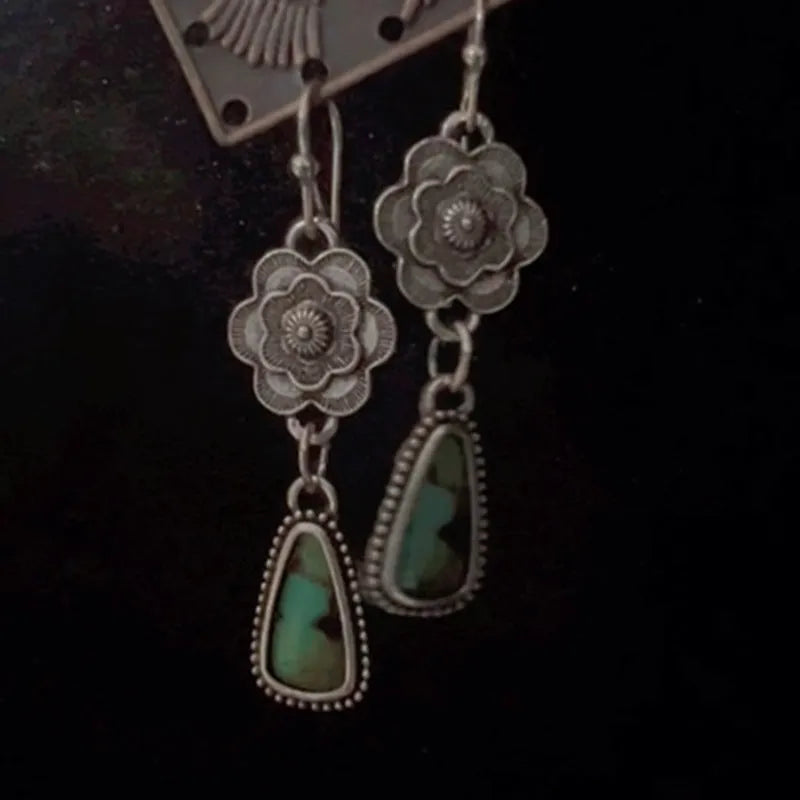 Silver metal carved floral tassel earrings in retro vintage botanical style for women