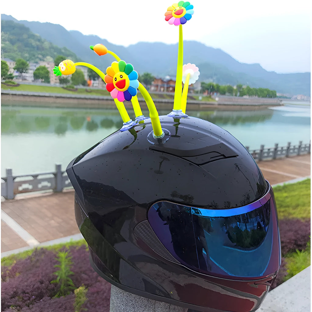 Silicone sunflower helmet decoration with suction cup base on a motorcycle helmet.