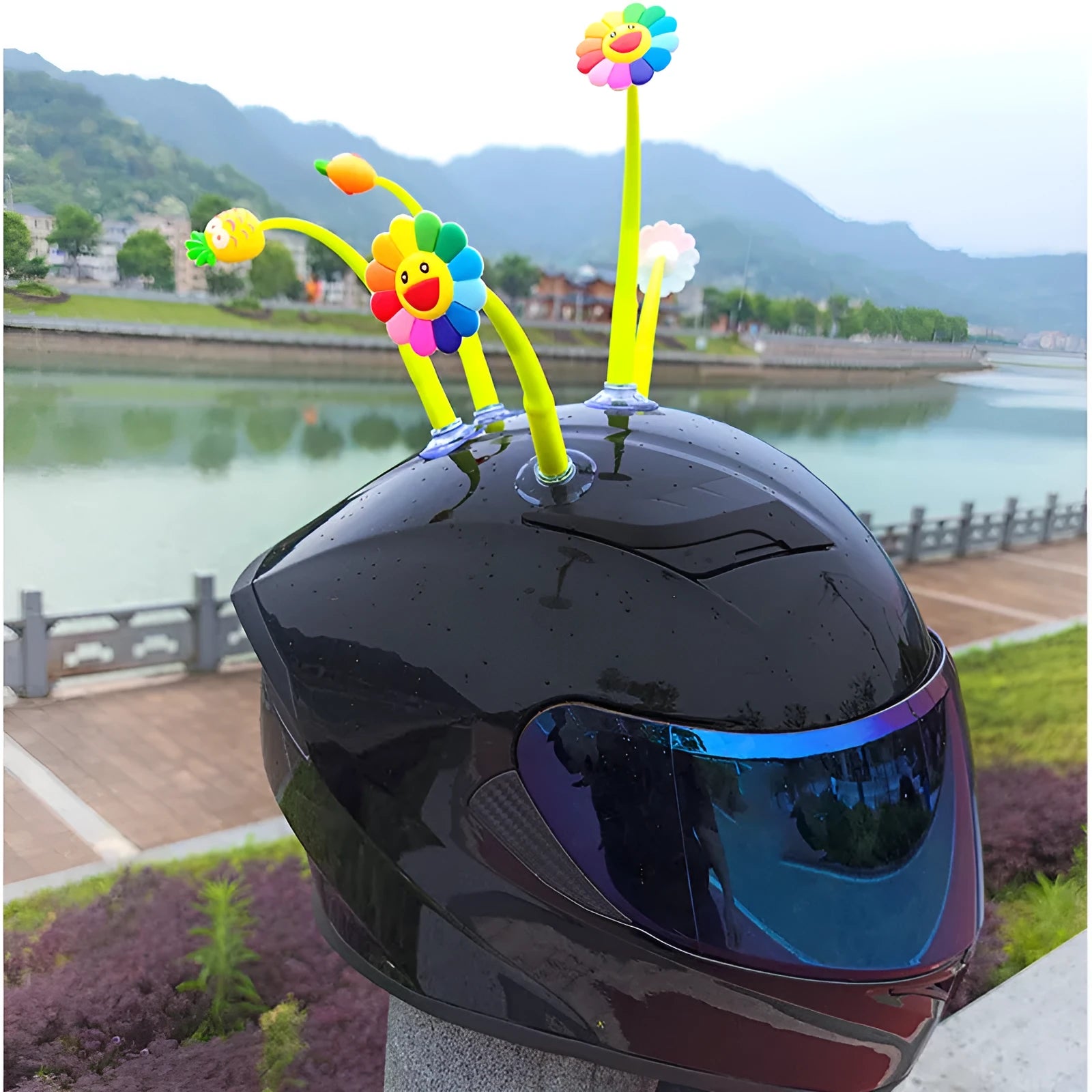 Silicone sunflower helmet decoration with suction cup base on a motorcycle helmet.