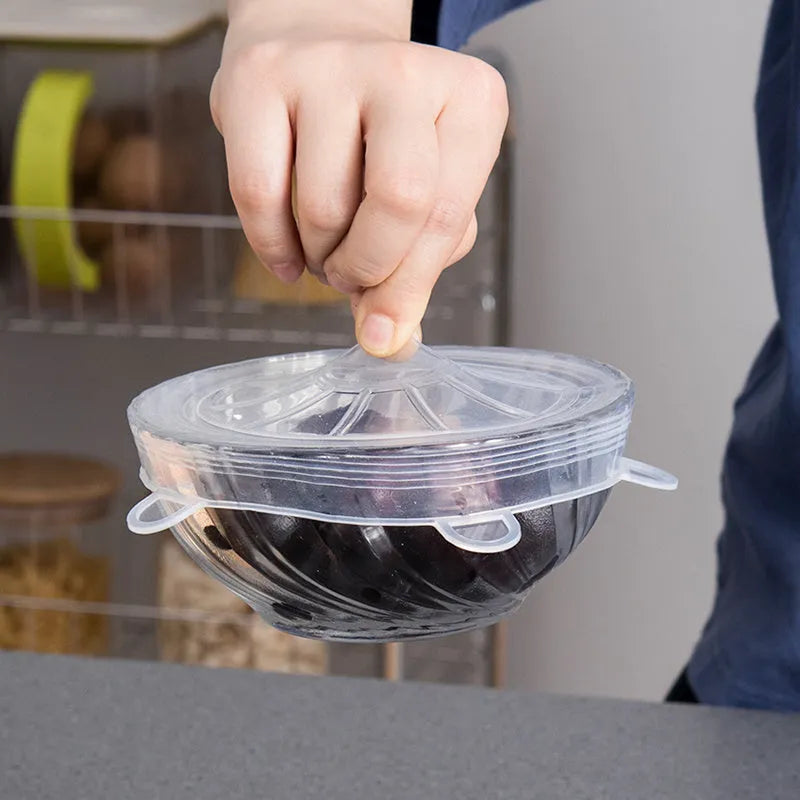 Six silicone stretch food cover lids in different sizes from 6.5cm to 20.5cm diameter