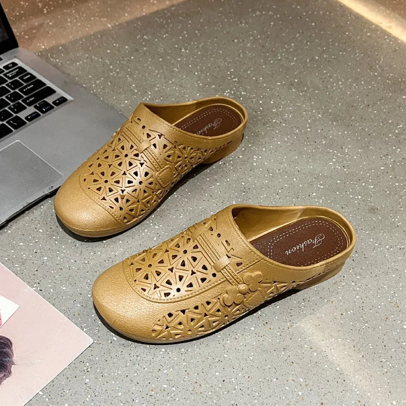 Adult flat toe box slippers in PVC with hollow-out design and faux fur collar.