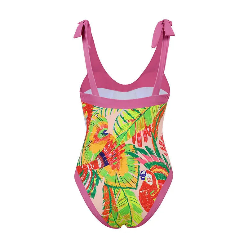 Retro pink floral print one-piece swimsuit with V-neck, covered belly and thin skirt overlay