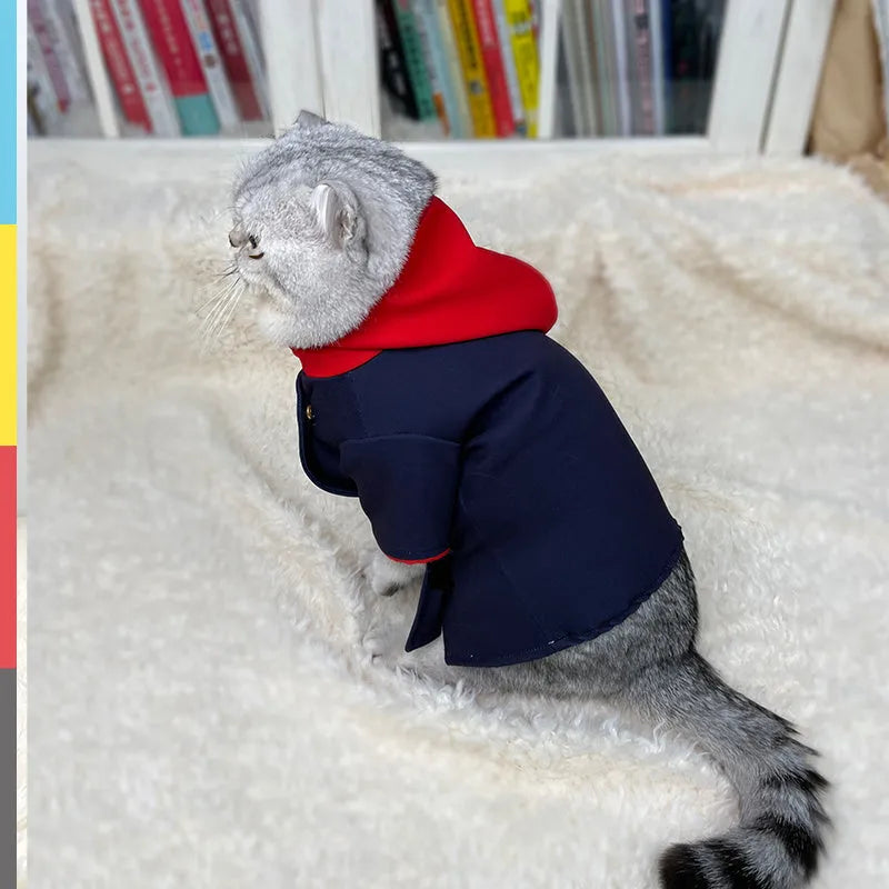 A dog or cat wearing a hoodie photo prop in a Tiger Staff Yuren colour pattern, sized small or medium.