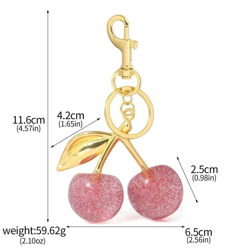 Zinc alloy cherry-shaped keychain pendant in red colour with three-dimensional design