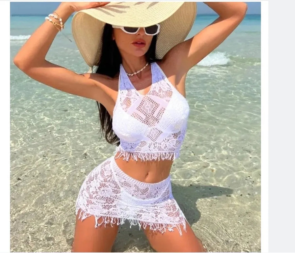 Women's white two-piece swimsuit with tassel skirt beach cover-up
