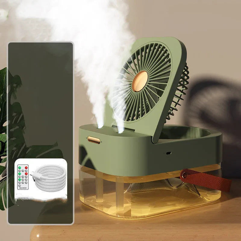 Portable pearl white USB desktop humidifier fan with remote control on a wooden desk.