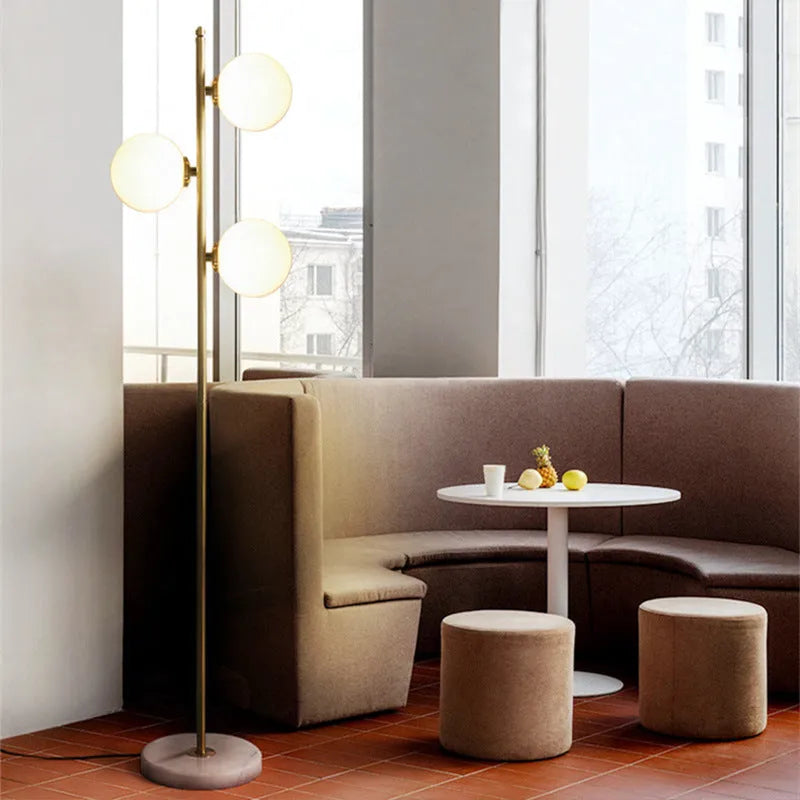 Creative minimalist floor lamp with gold aluminium alloy frame and glass detail, 155cm height, warm LED light