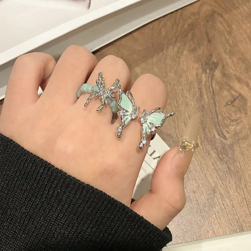 Adjustable copper butterfly women's ring with open-loop design in selected colour option