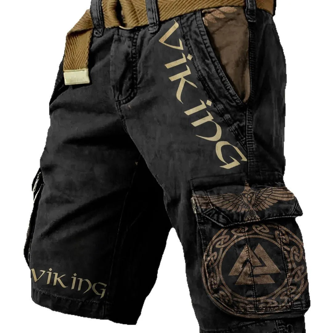Man wearing 3D digitally printed polyester shorts with a front zipper closure.