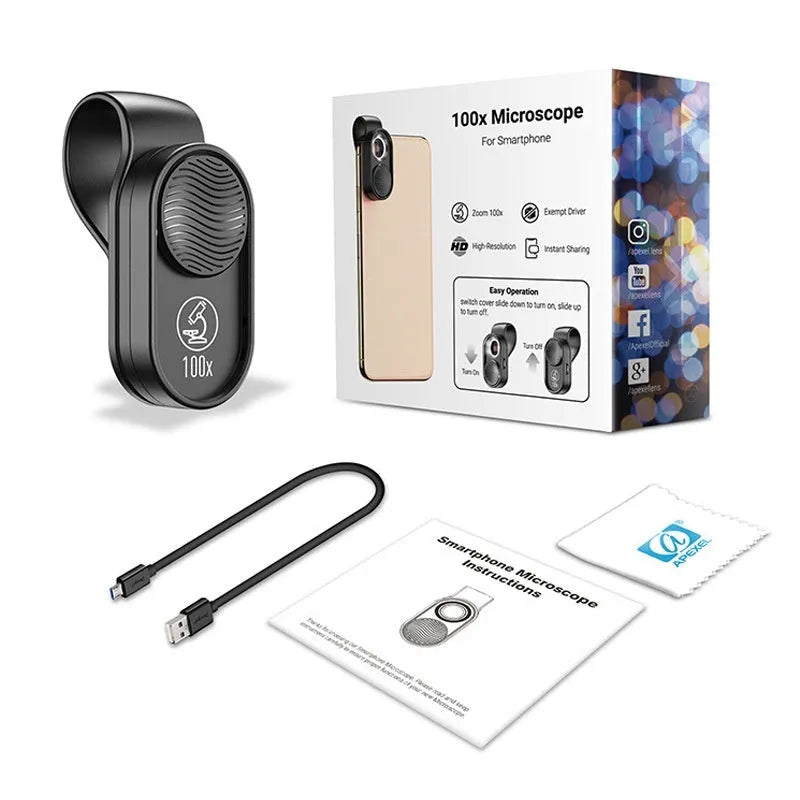 Black mobile magnification microscope with LED light clamped onto a smartphone showing 100x close-up view