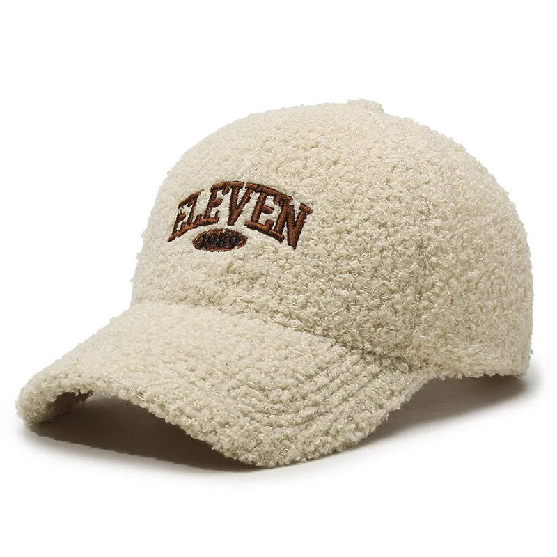 Adjustable winter baseball cap in lambskin polyester fabric showing dome crown design