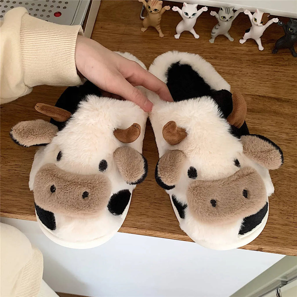 White cartoon cow slippers for women with soft faux fur and textured anti-slip soles