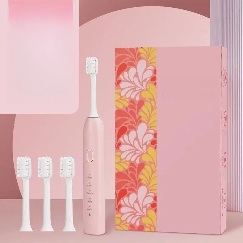 Small yellow duck design rechargeable electric toothbrush with soft bristles.