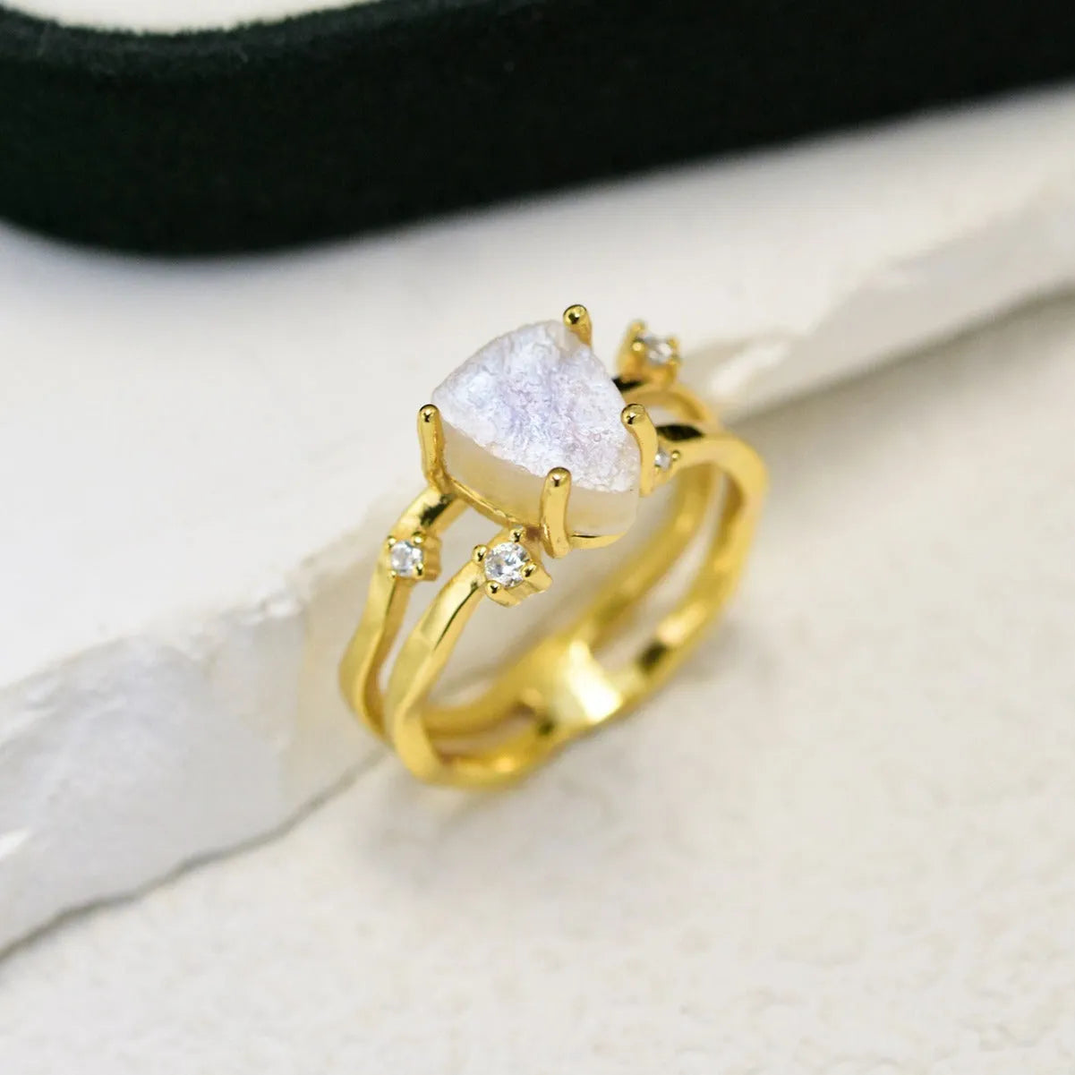 S925 silver geometric ring with an irregular triangle shape and moonstone setting in rose gold, white, or yellow gold colour.