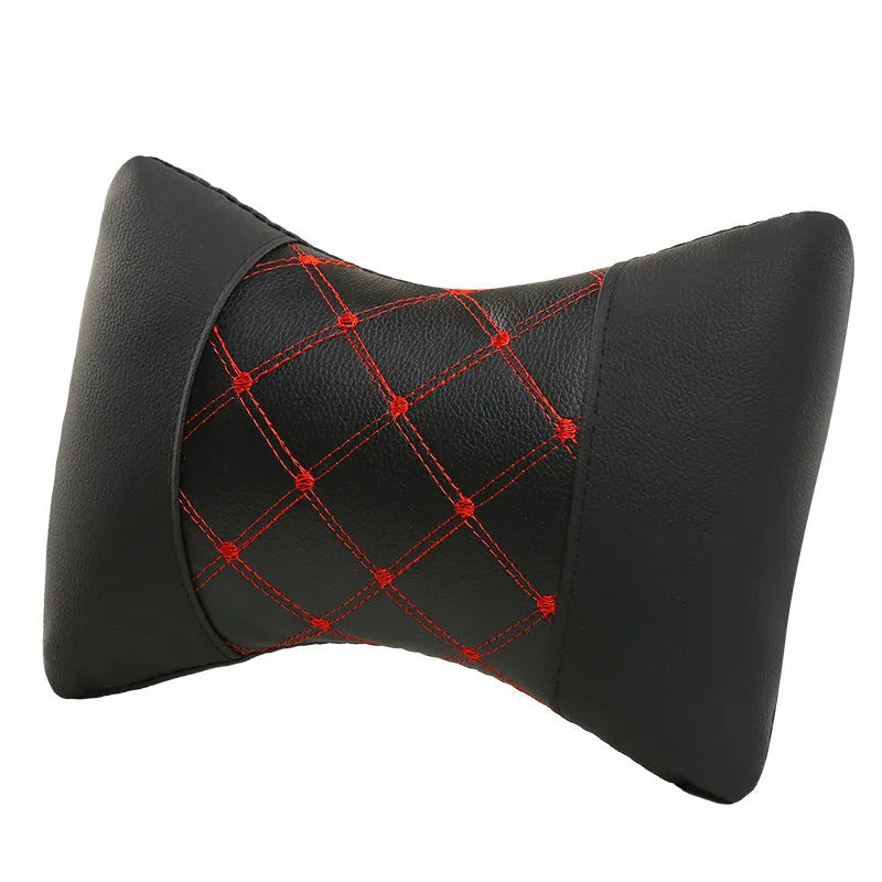Black quilted diamond-pattern car headrest neck pillow with contrast stitching.