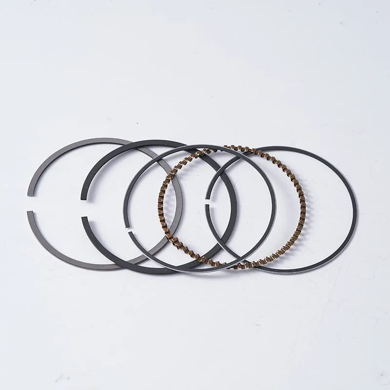 Motorcycle piston kit showing aluminium alloy piston with steel oil ring for 57.4mm cylinder engines