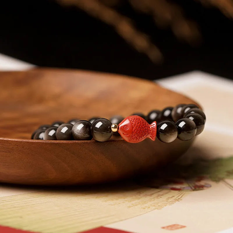 Natural obsidian bracelet with cinnabar fungal accents showing round beads in available sizes