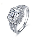 Women's geometric ring with hollow design and inlaid zircon stone in platinum colour.