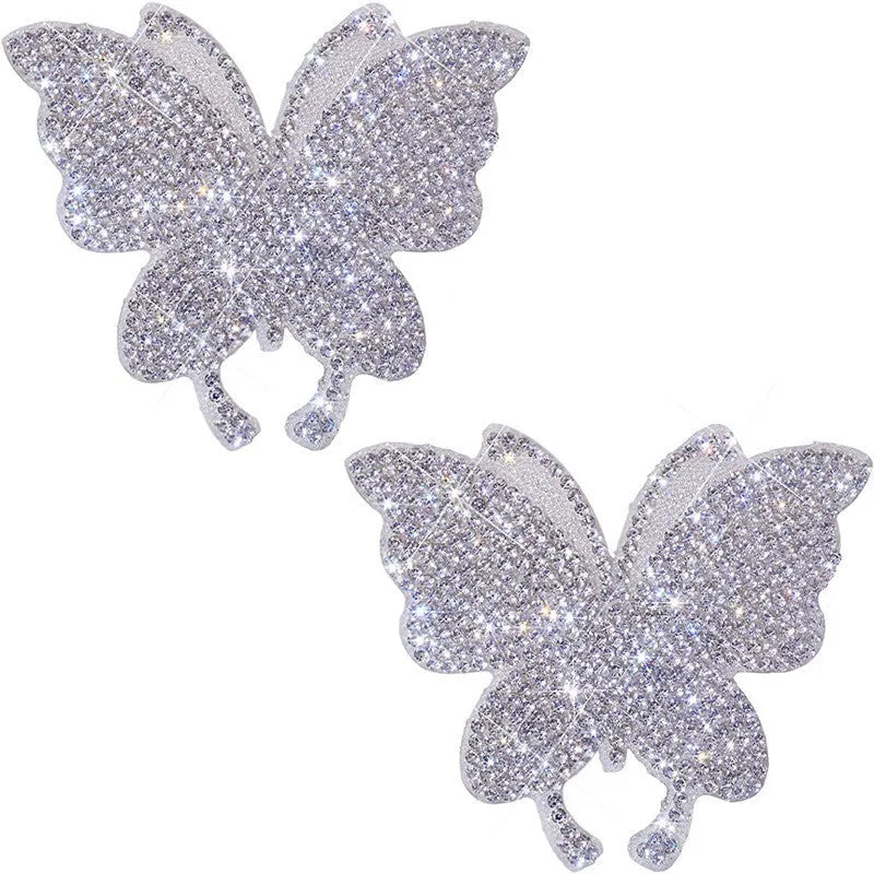 Diamond-encrusted glass car sticker with butterfly and bear claw design for vehicle decoration.