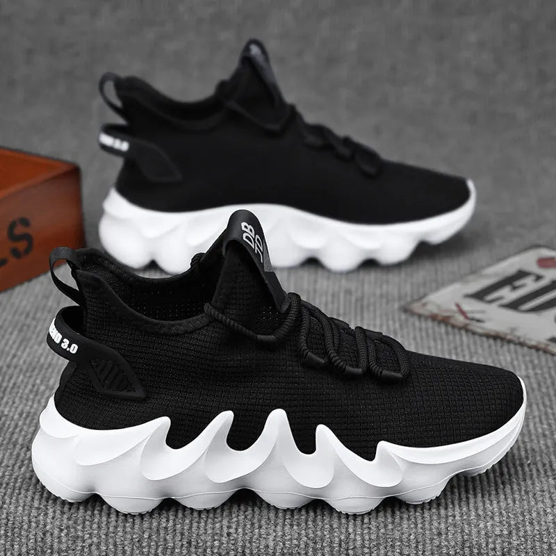 Men's black lightweight sock-like sports shoes with lace-up front and round toe on wear-resistant sole.