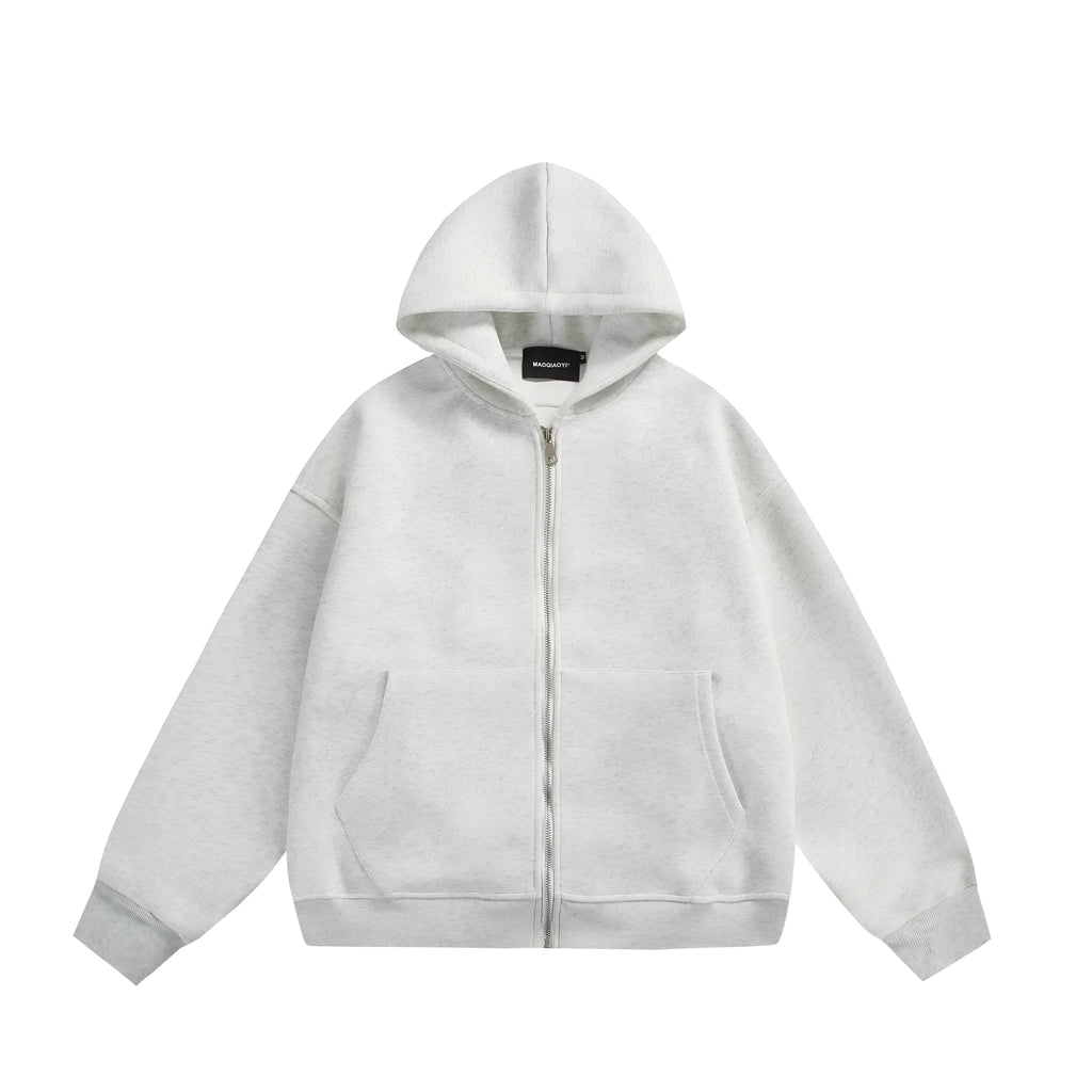 Loose fit solid colour cardigan coat featuring a small bag design on the back.