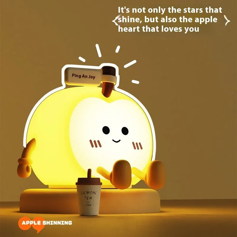 Qian'an Xile night light with geometric stereo design, USB charging, and yellow LED glow on a desktop