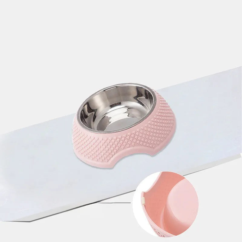Set of four stainless steel pet bowls in blue, green, and pink colours on a non-slip base