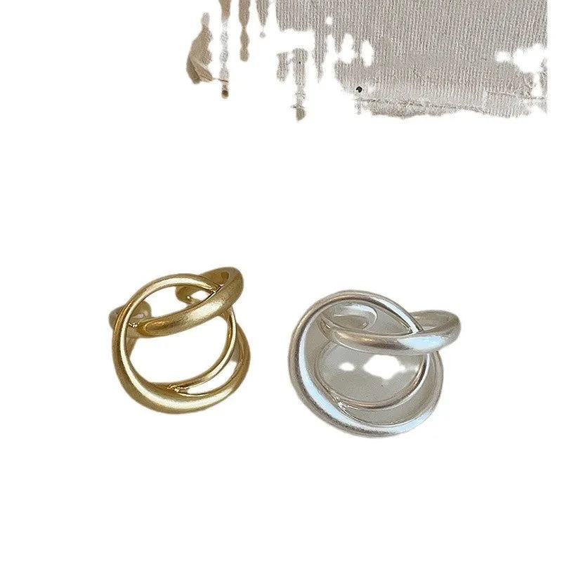 Three-dimensional interlaced matte metal open ring for women in geometric design